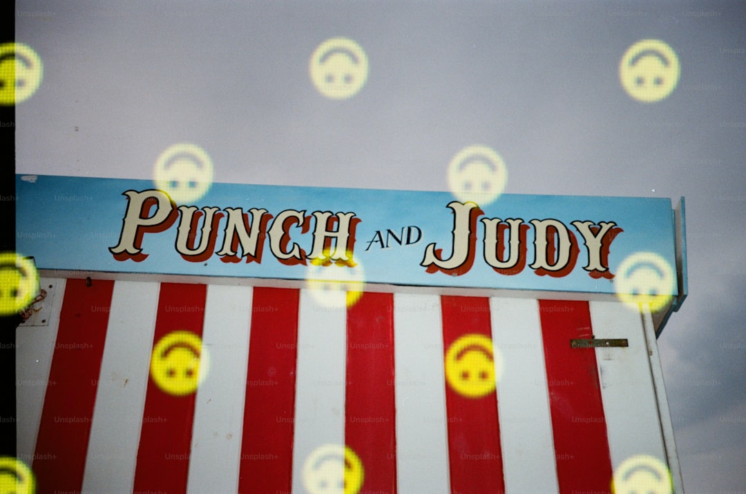 Punch and judy show booth with smiley faces