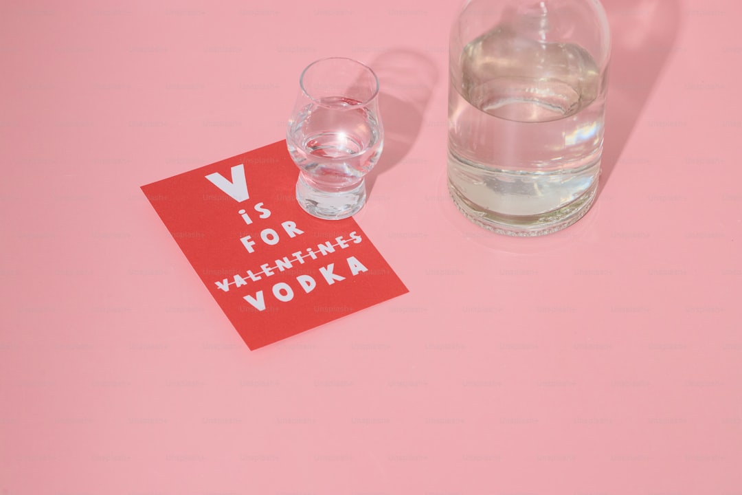 Vodka bottle and shot glass with valentine's card