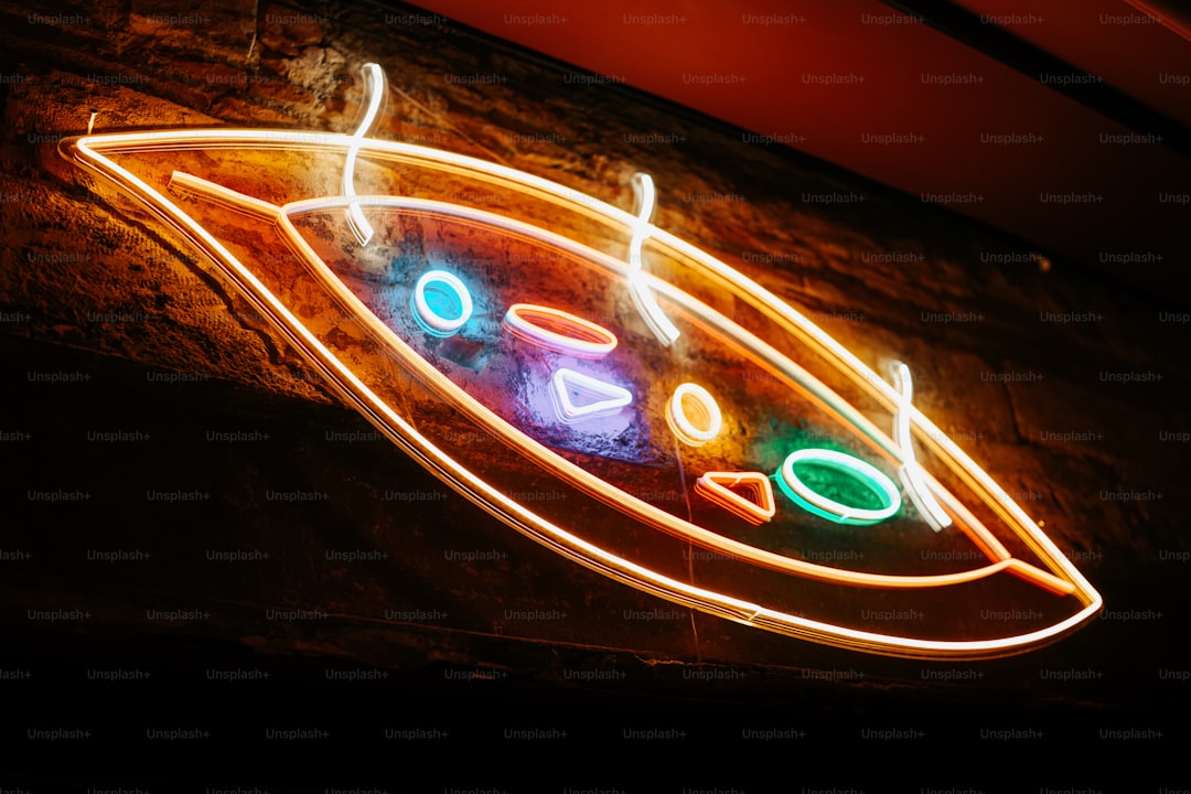 a neon sign on the side of a building